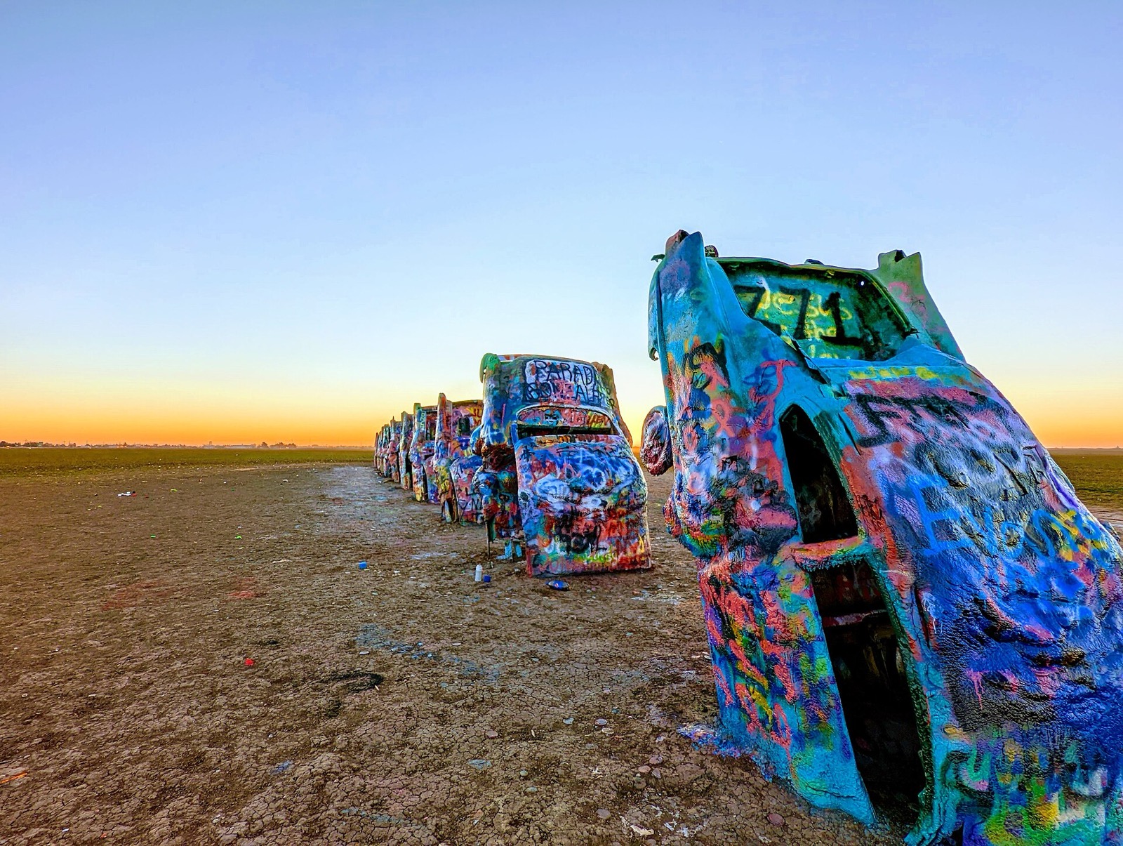 Painted Cadillacs at Cadillac Ranch at sunrise
